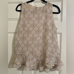 Like new Loft sleeveless shirt with ruffle detail on bottom. Size medium.